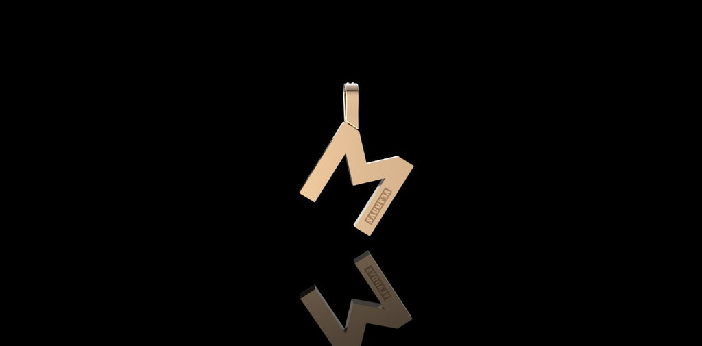 14k yellow gold initial M pendant with pink sapphires and diamonds