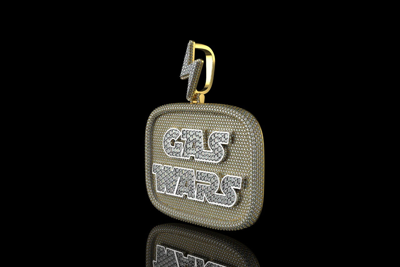 14k 2 tone yellow and white gold "gas wars" style baguette diamond pendant