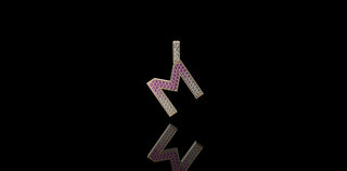 14k yellow gold initial M pendant with pink sapphires and diamonds