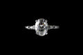 18k white gold custom made oval shape diamond engagement ring with tapered baguette side accent diamonds
