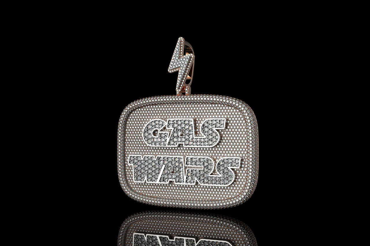 14k 2 tone rose and white gold "gas wars" style baguette diamond pendant