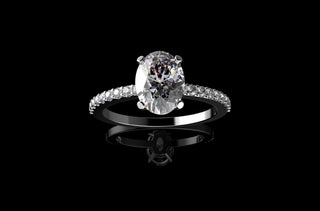 18k white gold oval shape solitaire diamond engagement ring with classic diamond band