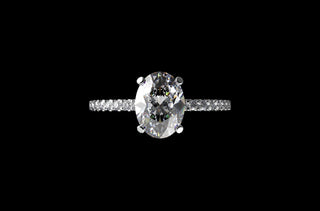 18k white gold oval shape solitaire diamond engagement ring with classic diamond band